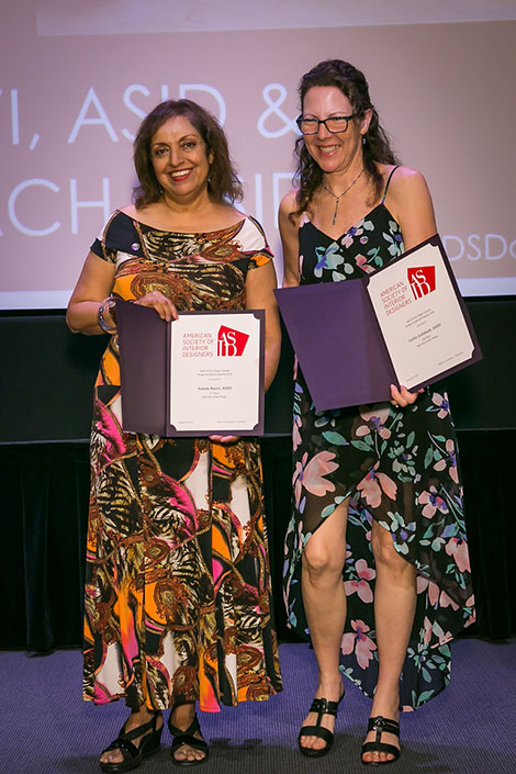 DI faculty member Anjum Razvi (left) receives her award